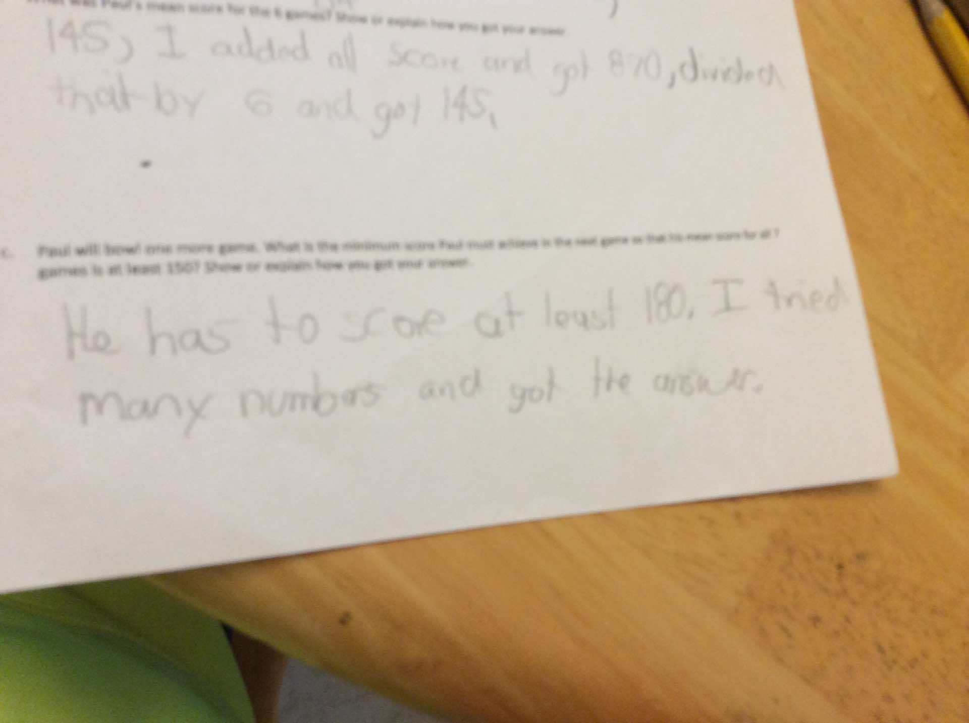 This is a student's math work on a paper for median based problem